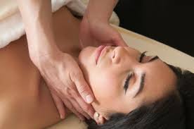 woman receiving lymphatic drainage session